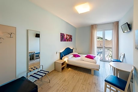 Standard Triple Room with Balcony and Partial Lake View