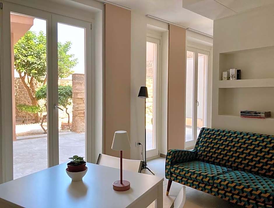 ClickSardinia Alghero Spectacular waterfront Neptune apartment with sea-facing terraces and garden