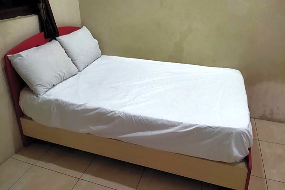 SPOT ON 92424 Wulan Homestay Syariah