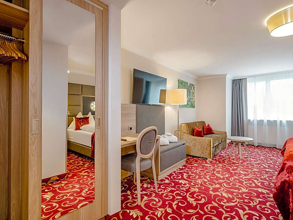 Hotel Norica - Thermenhotels Gastein mit dem Bademantel direkt in die Therme