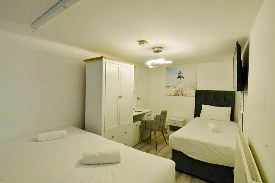 Photo 1 of 21 of Compact Triple Room