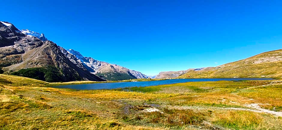 Chez Philippe - Appartements et Chalets - Panoramic Village vue Glaciers