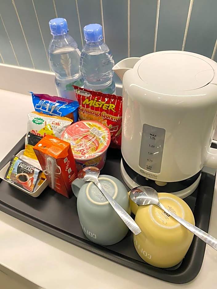 EMKA Lodge studio room the vertu apartemen ciputra world surabaya