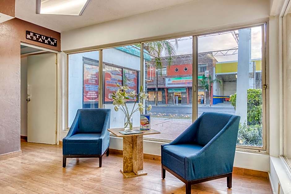 Capital O Hotel La Siesta