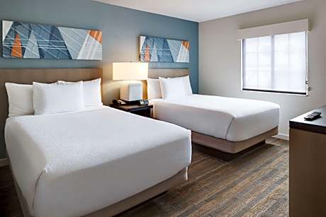 Specialty Suite with Two Double Beds and Sofa Bed