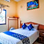Capital O Hotel Aurora