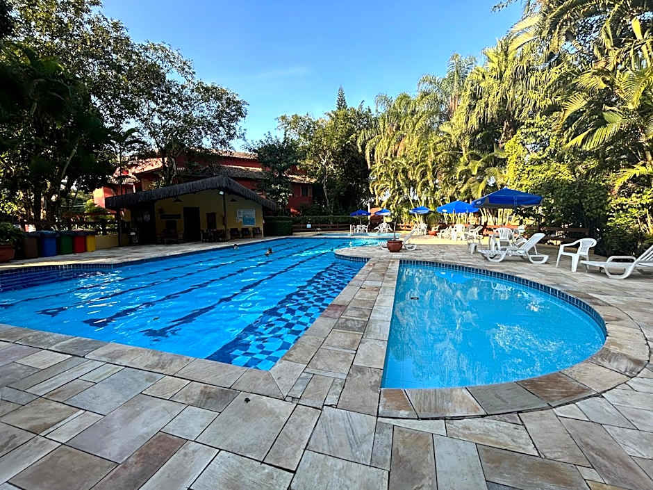 Flat Estudio 220 amarílis 3 Piscinas climatizadas, carregar veiculo eletrico, Bertioga, Riviera de São Lourenço Apartamento estúdio, cozinha equipada completa, serviço de hotelaria, limpeza e trocas diária de toalhas, WI-FI 500 MB