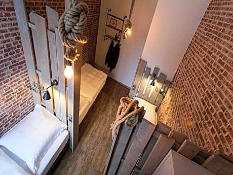 Single Bed in Dormitory Room