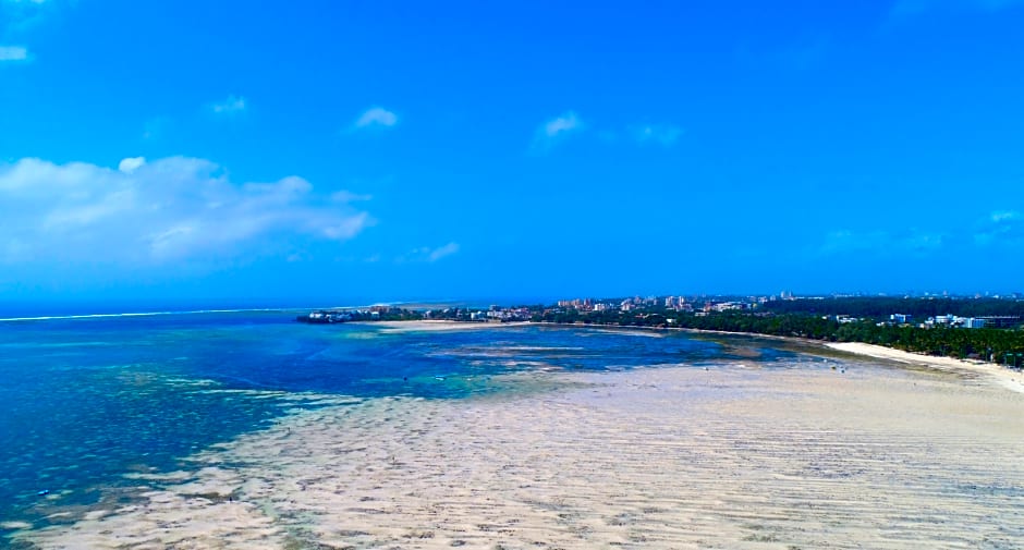 Travellers Beach Hotel & Club