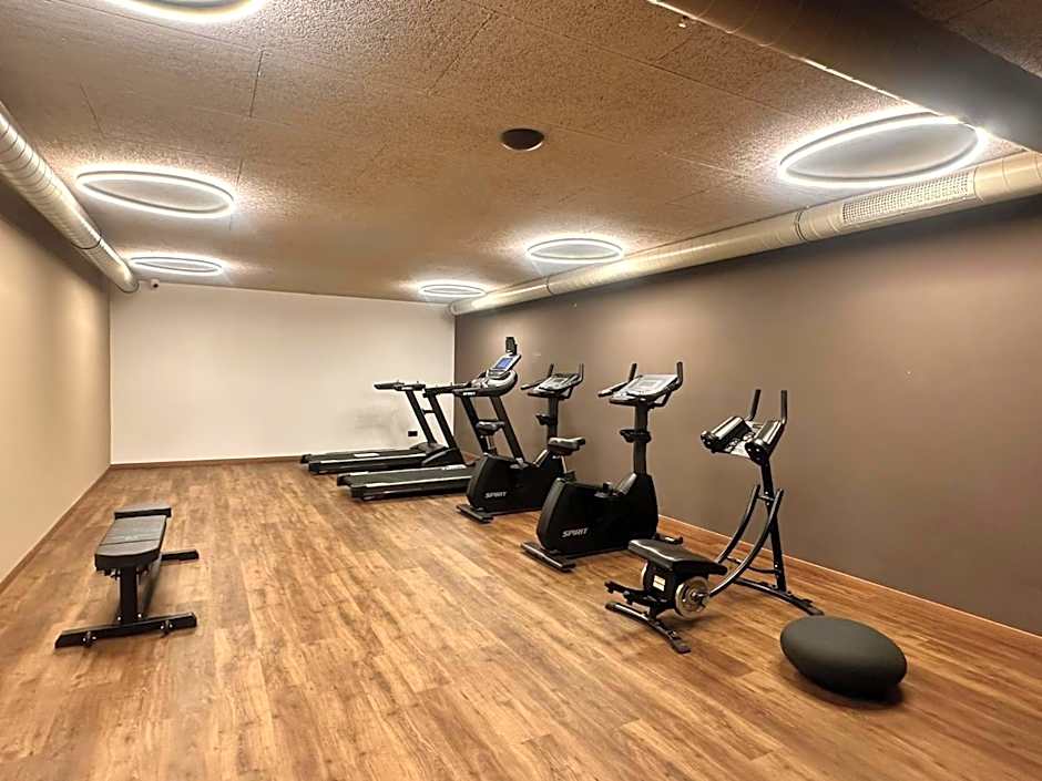 Aparthotel Familiaris - Family Apartments - Pools & Spa in Dolomites
