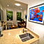 Tropical Beach Condo - Pool, Shops, 86" TV, WiFi