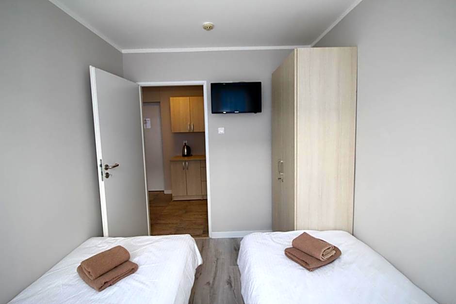 Pod Kominem Pokoje i Apartamenty