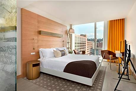 Classic King Room with Partial Water View and Roll-in Shower - Mobility Accessible
