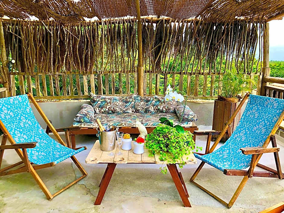 Eliza, Bangalô vista mar em Trancoso