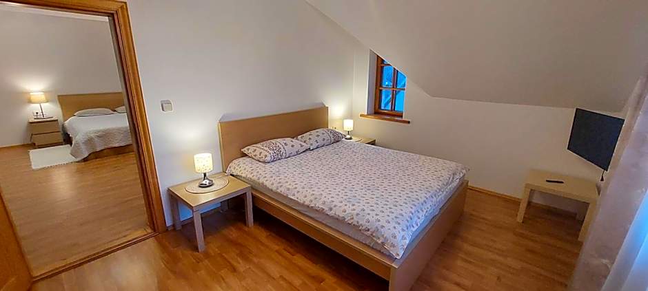 Apartamentai šalia baseino