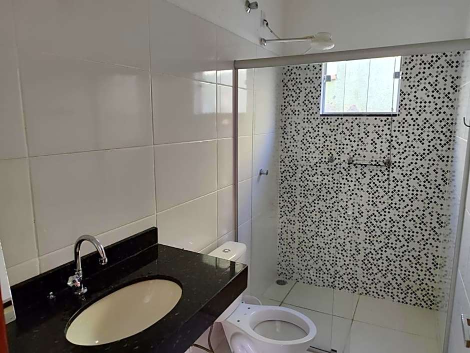 Casa espaçosa em frente à pracinha