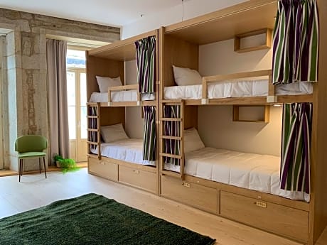 Bed in 12-Bed Female Dormitory Room