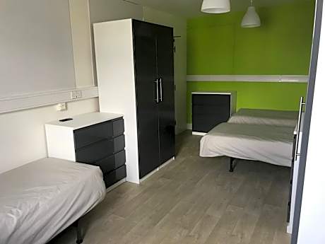 Single Bed in Male Dormitory Room