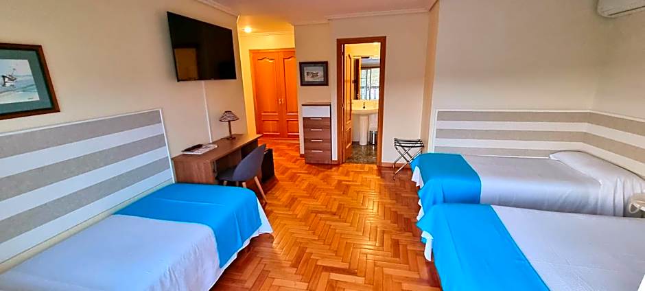 Photo 1 of 5 of Quadruple Room