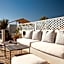 Riad Le J