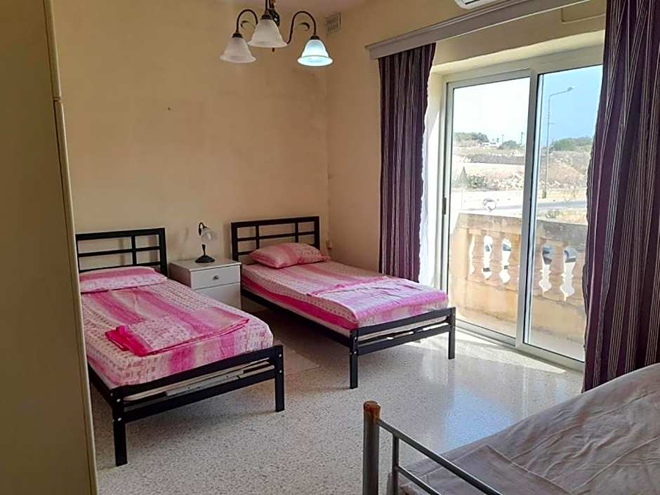 Photo 1 of 2 of Twin Room with Shared Bathroom