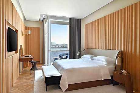 the katara suite, club lounge access, 1 bedroom suite, 1 king, pool view, terrace