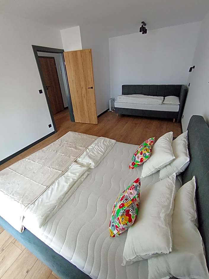 APARTAMENTY PIASKOWE BŁĘKITNA