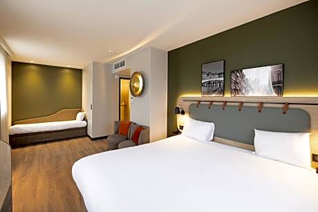 Quadruple Room with One Double Bed and Two Single Beds or Sofa Bed