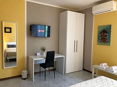 Quadruple Room with Private Bathroom