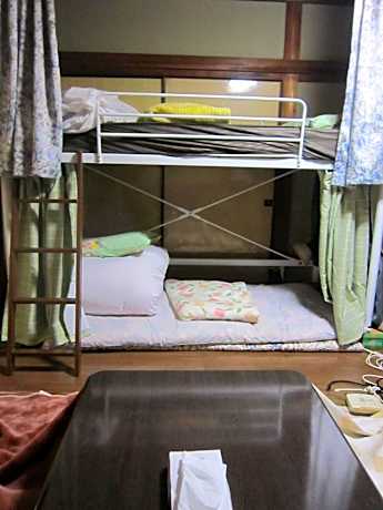 Single Bed in Dormitory Room