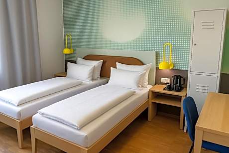 Single Bed in Female Dormitory Room