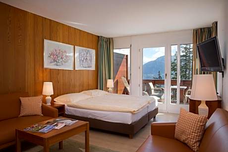 Family Room (2 Adults + 1 Child) with Balcony and Mountain View