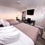 Metropolitan Inn & Suites