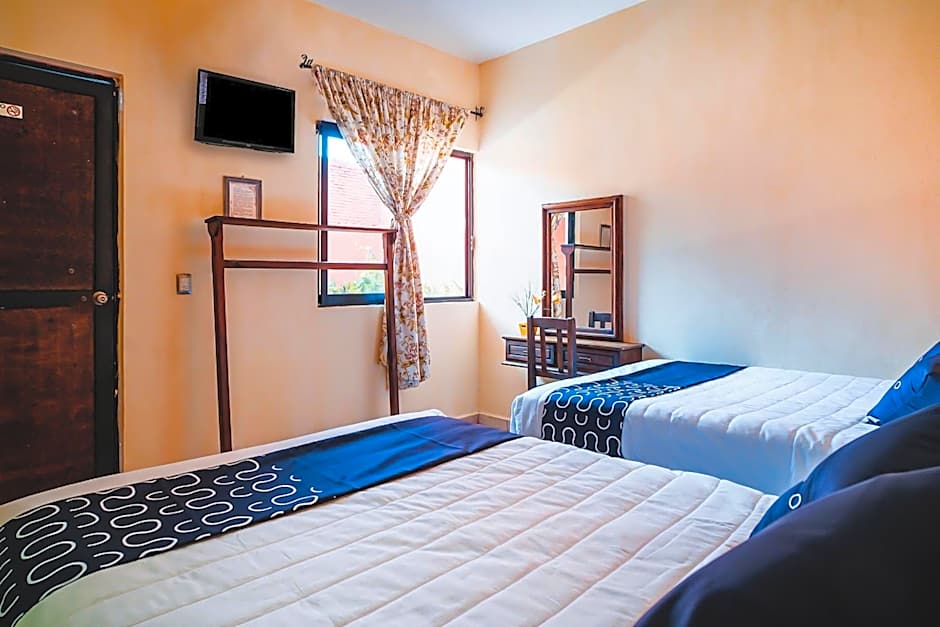 Capital O Hotel Aurora