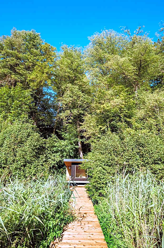 Pustelnia Supraśl - domki nad rzeką