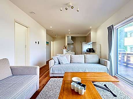 A villa overlooking the sea and mountains.