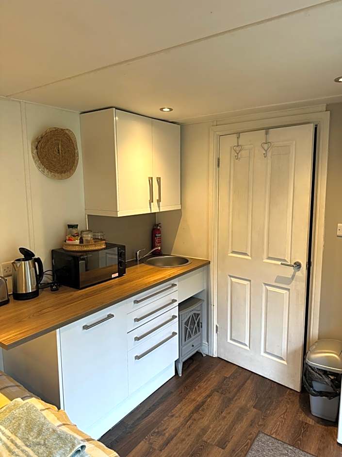 Apple tree hut, in a private garden