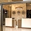 Hotel Grand One Plaza