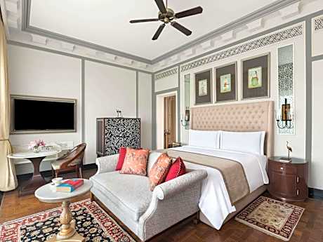 Flamingo Signature King Room with Balcony:15% off on F&B, Spa | soulful yoga experience| Morning & Evening Aarti | traditional & nature led experiences daily tea,curated walks,bird watching, Prana Garden, Rajasthani folk dance, Pottery, Mehendi, Astrology