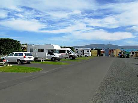 Powered Site with Shared Bathroom - No Bed Provided