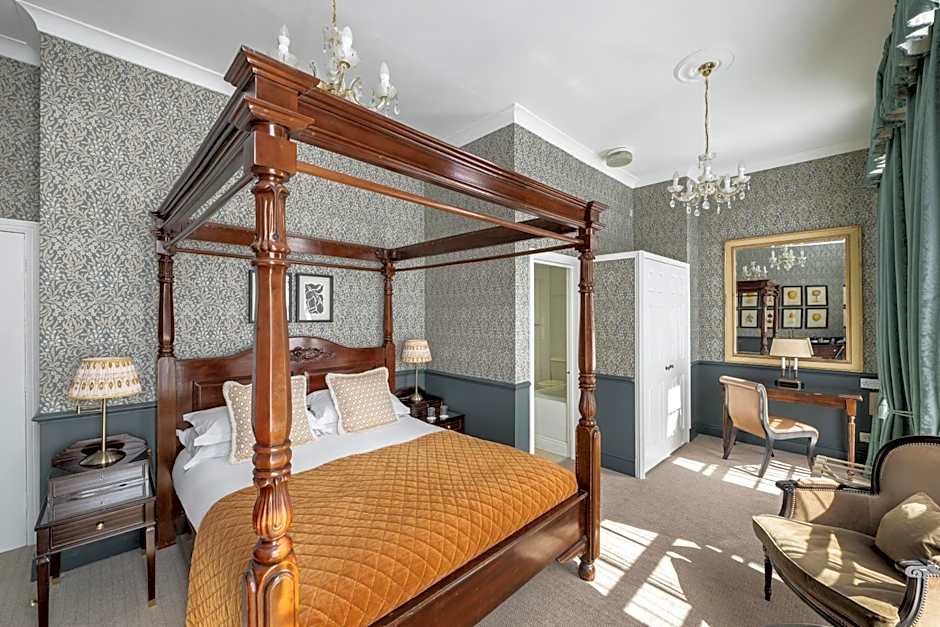 Photo 1 of 9 of Four Poster Room