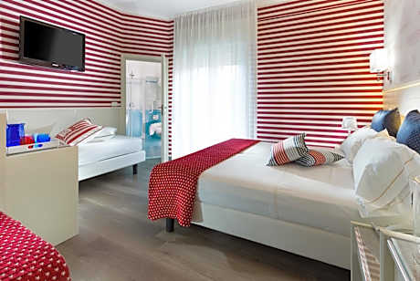 Deluxe Quadruple Room with Balcony