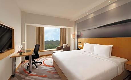 Superior 1 Queen Bed Poolside with 20% Discount on Food and Soft Beverages and Travel Desk