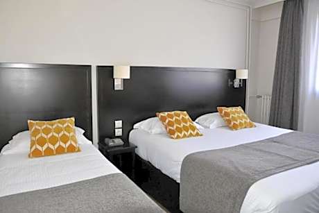 Standard Queen Room with One Queen Bed and One Single Bed
