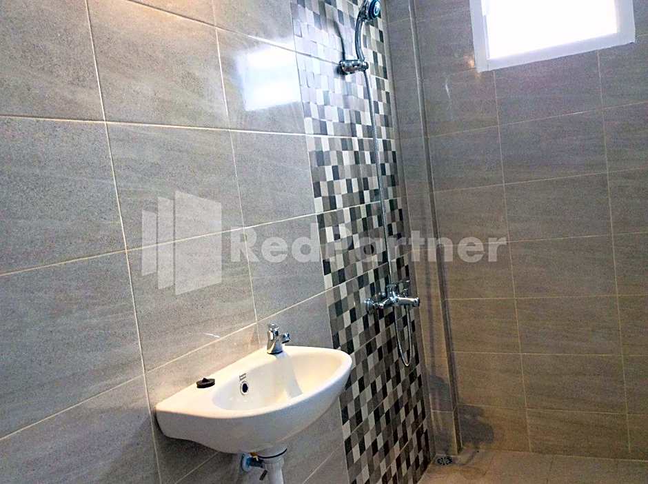 TERRA Guesthouse JEC Mitra RedDoorz