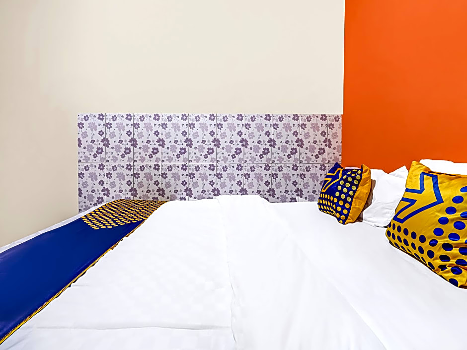 SPOT ON 91186 Losmen Yanti