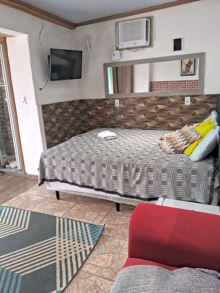 Pousada Marambaia Café - Praiana, econômica, Com café da manhã, piscina ao ar livre e hidromassagem aquecida -Frente para o mar