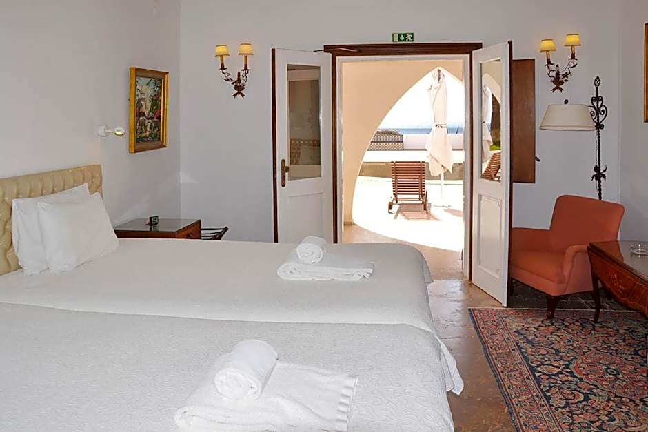 Casa Três Palmeiras