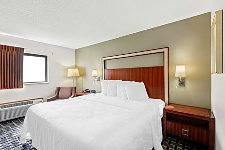 King Room with Mobility Accessible Tub and Sofa Bed