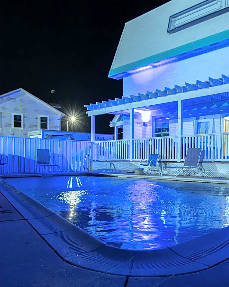 NEW 2026-Ocean Sands Beach Boutique Inn-24Hr Sauna and Salt-Mineral Pool-Free Beach Bikes and Famous Beach-Fresh Baked Cookies-Popcorn-In Room Bathrobes-Sunscreen-65 Inch TVsNetflix-Bedside Candy-Free Laundry- 4 Grand Black Beds-Call & Save-1-252-AHA-SAND
